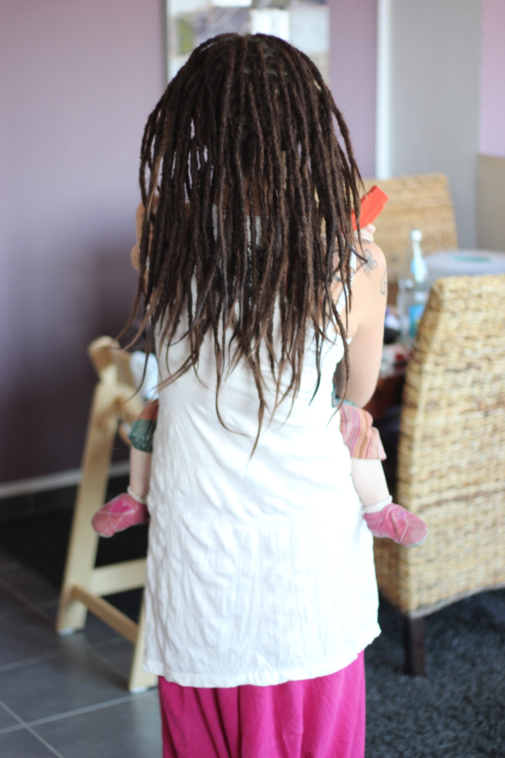 Girl with Dreadlocks and Baby
