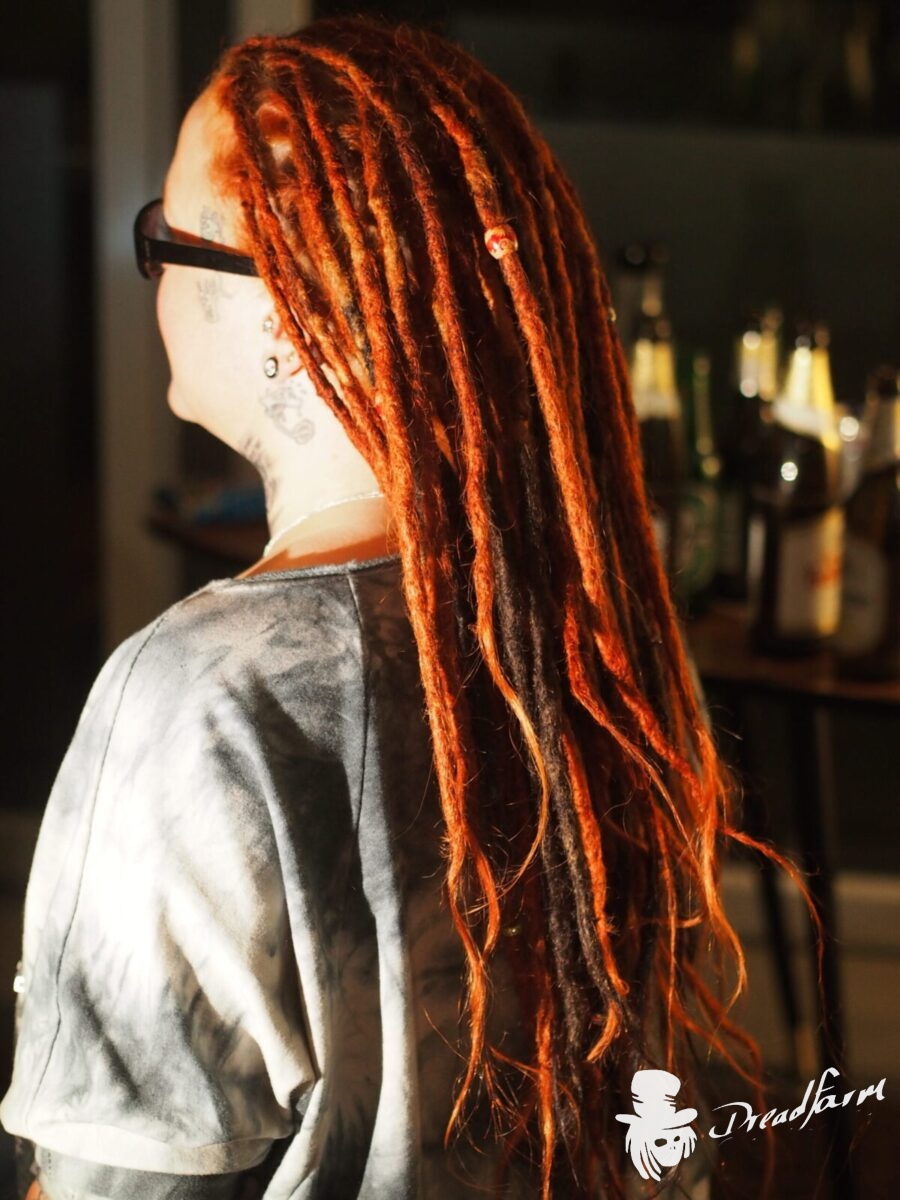 woman with dreads long red and black dreadlocks, dreadlocks in bw, dreadlocks in Baden-Württemberg, dreads  dreadcreations, dreadtastic, dreadfarm,